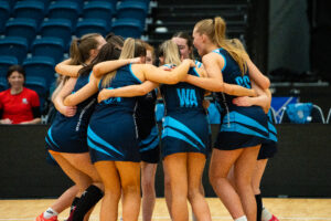 Netball Team Huddle to show their support for each other