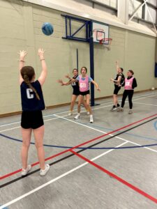 girls playing netball games after training