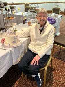 Agnes O'Brien, Scottish Thistle #54 celebrates 80th birthday with her Netball Family